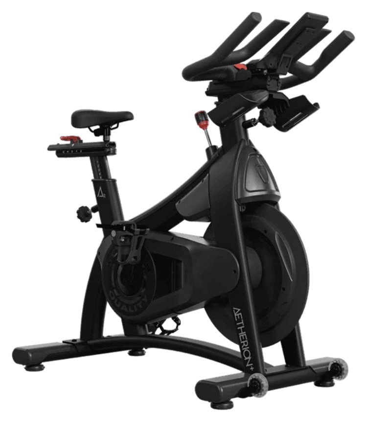 The Schwinn Aetherion studio bike in matte black with red adjustment knobs