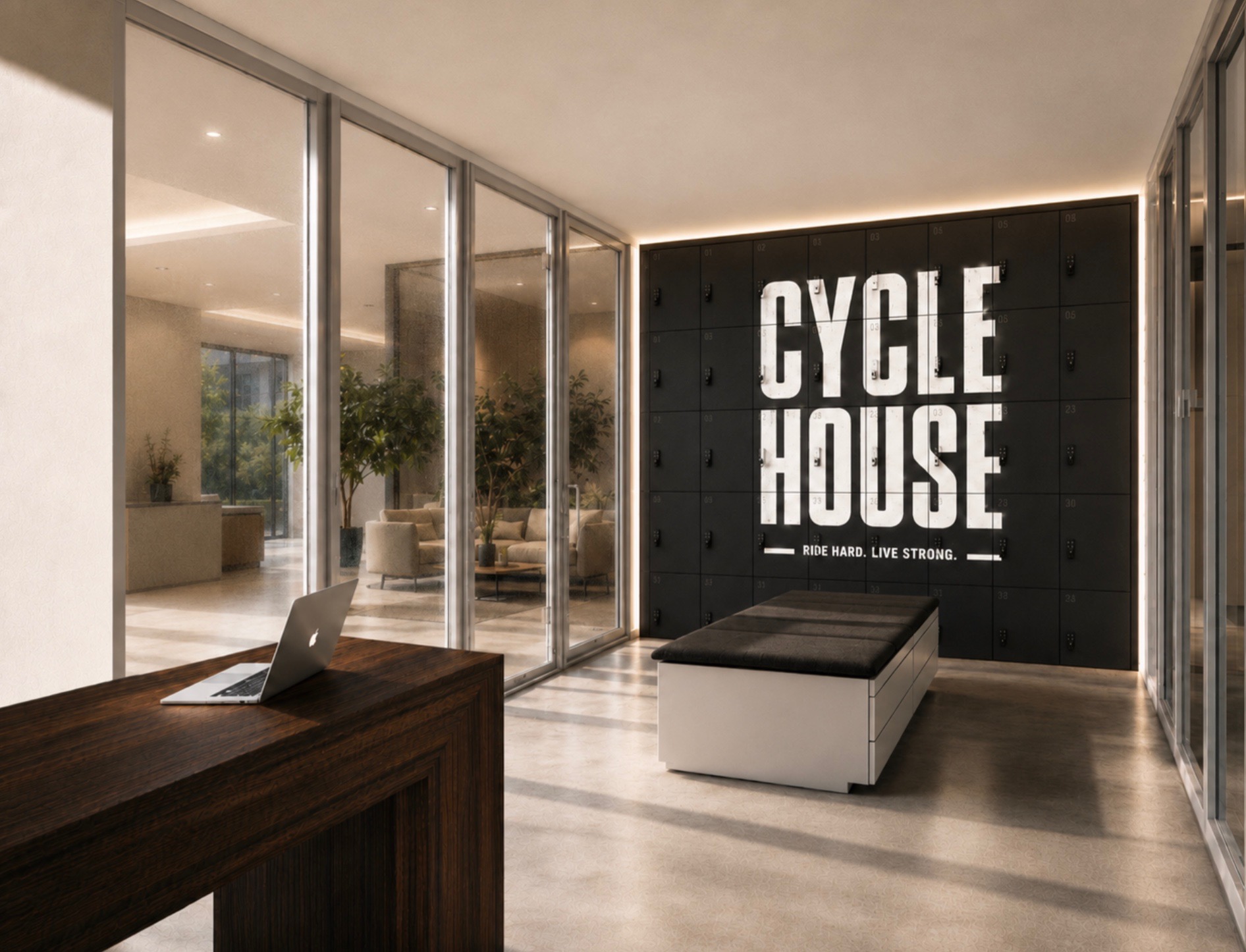 The Cycle House lobby: a wood front desk, warm light and a wall of keypad lockers lit with the Cycle House name